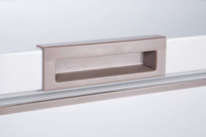 Close up of chest freezer lid handle